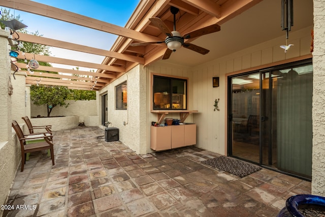 view of patio with ceiling fan