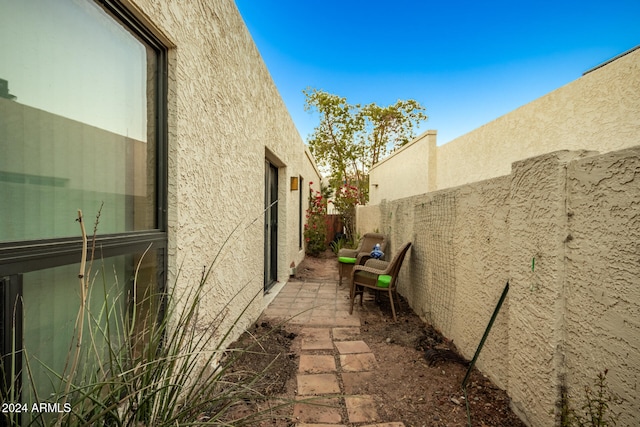 view of property exterior featuring a patio