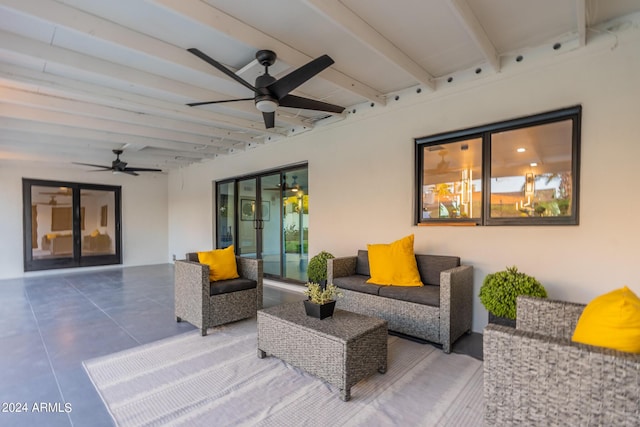 view of patio featuring an outdoor living space and ceiling fan