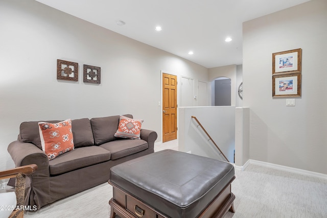 living room with light colored carpet