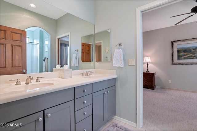 bathroom with vanity and ceiling fan