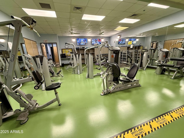 gym featuring a drop ceiling and visible vents