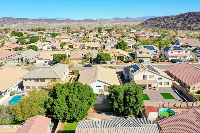 aerial view featuring a mountain view and a residential view