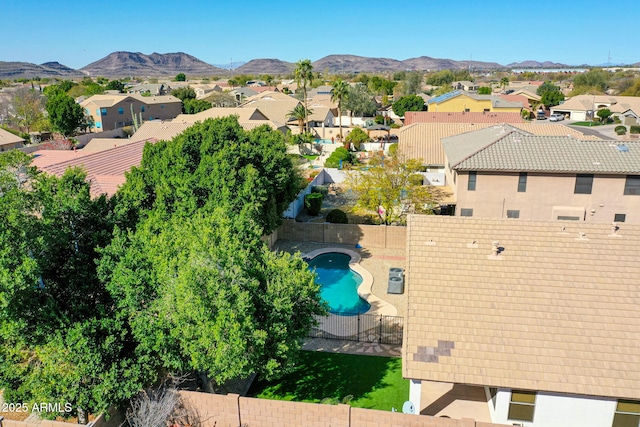 birds eye view of property featuring a mountain view and a residential view