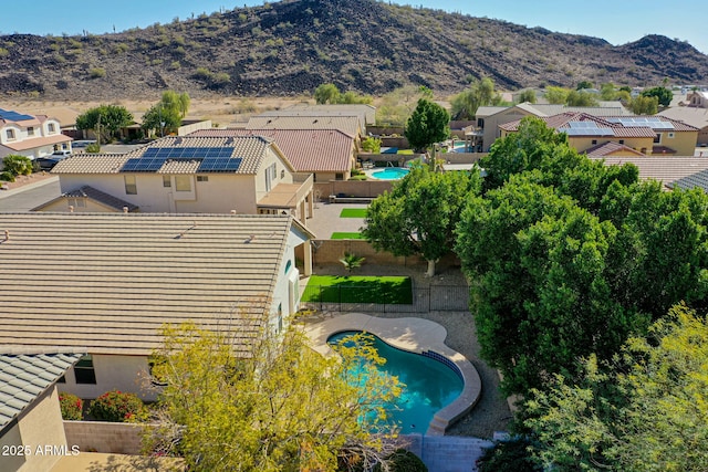 aerial view featuring a mountain view and a residential view