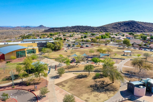 drone / aerial view featuring a mountain view and a residential view