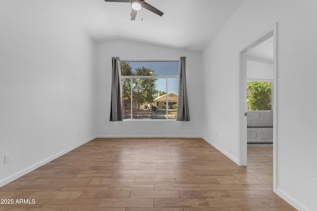 1405 E Chicago Cir, Chandler, AZ 85225 - empty room with a ceiling fan, wood finished floors, and vaulted ceiling
