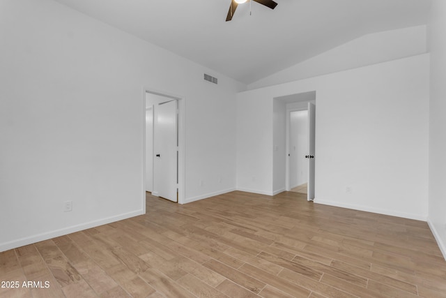1405 E Chicago Cir, Chandler, AZ 85225 - spare room featuring ceiling fan, vaulted ceiling, and light wood-type flooring