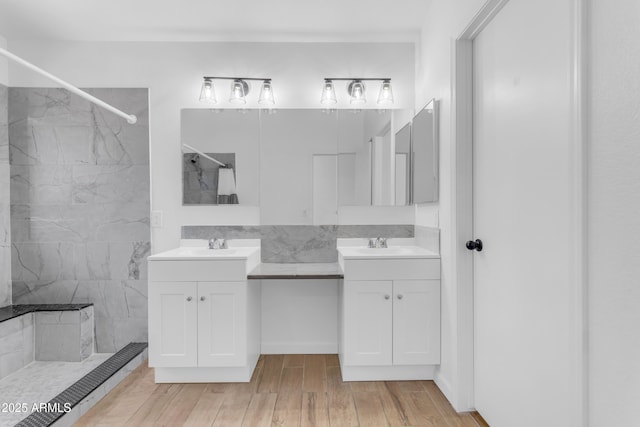 1405 E Chicago Cir, Chandler, AZ 85225 - bathroom with tiled shower, two vanities, and wood finished floors