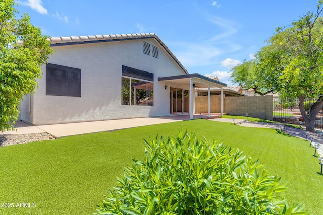 1405 E Chicago Cir, Chandler, AZ 85225 - back of house featuring stucco siding and a patio