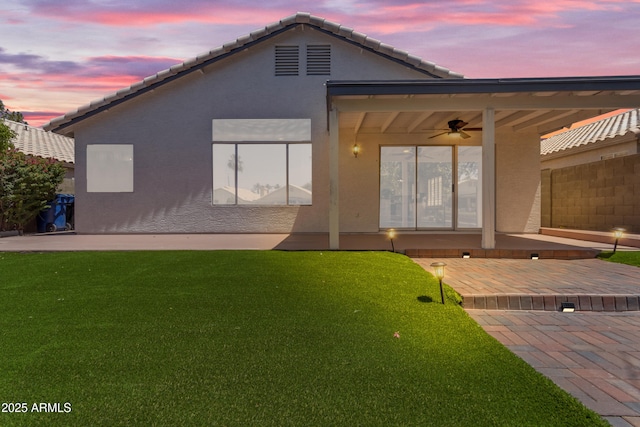 1405 E Chicago Cir, Chandler, AZ 85225 - back of property with ceiling fan, a patio area, stucco siding, and a tiled roof