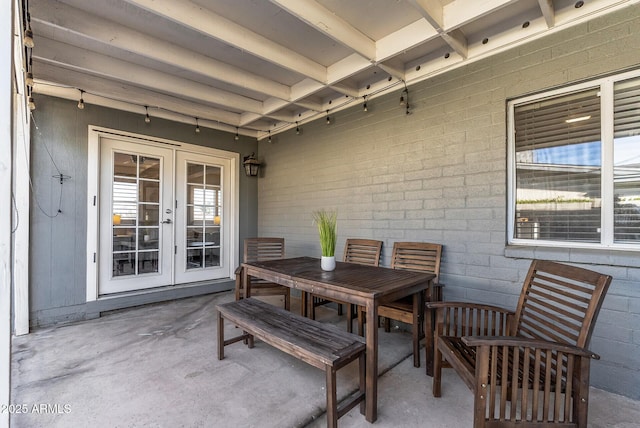 7743 E Roosevelt St, Scottsdale, AZ 85257 - view of patio / terrace featuring french doors and outdoor dining area