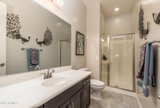 full bathroom with vanity, a shower stall, toilet, and recessed lighting