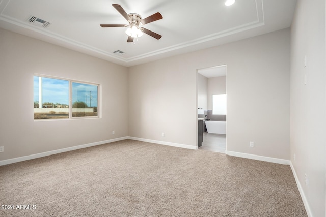 29785 N 203rd Dr, Wittmann, AZ 85361 - empty room with plenty of natural light, carpet, ceiling fan, and baseboards