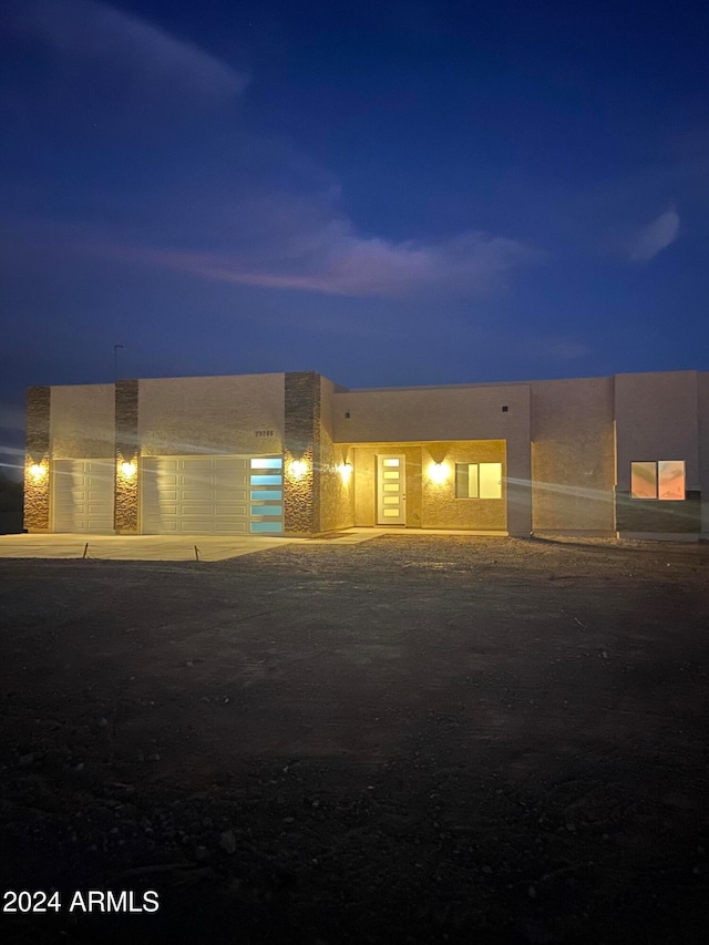 view of front of property featuring a garage