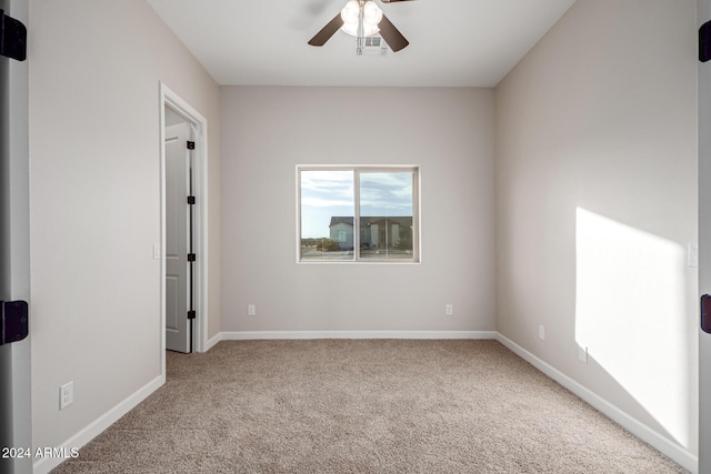 29785 N 203rd Dr, Wittmann, AZ 85361 - unfurnished room featuring ceiling fan, carpet, and baseboards
