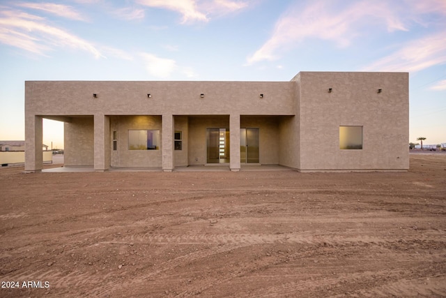 29785 N 203rd Dr, Wittmann, AZ 85361 - rear view of house featuring a patio and stucco siding