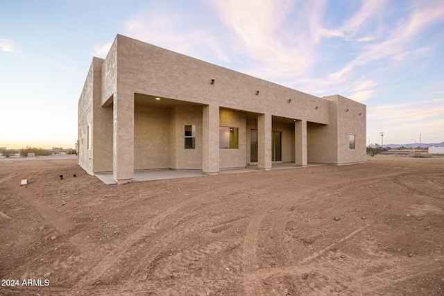 29785 N 203rd Dr, Wittmann, AZ 85361 - rear view of property featuring a patio and stucco siding
