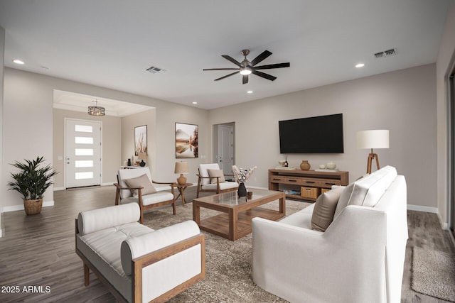 29785 N 203rd Dr, Wittmann, AZ 85361 - living area featuring baseboards, wood finished floors, a ceiling fan, and recessed lighting