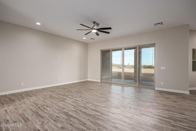 29785 N 203rd Dr, Wittmann, AZ 85361 - spare room with a ceiling fan, wood finished floors, baseboards, and recessed lighting