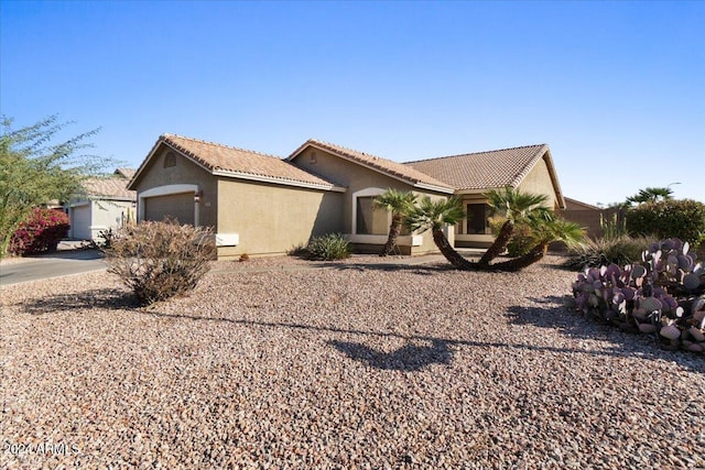 view of front of property featuring a garage