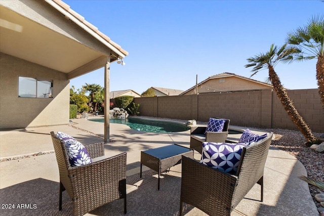 view of patio featuring a fenced in pool