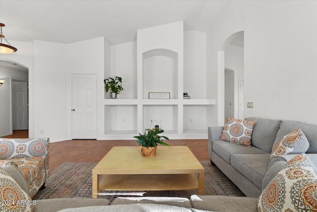 tiled living room with built in shelves