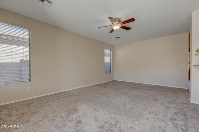 unfurnished room with light carpet and ceiling fan