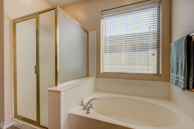 bathroom with independent shower and bath