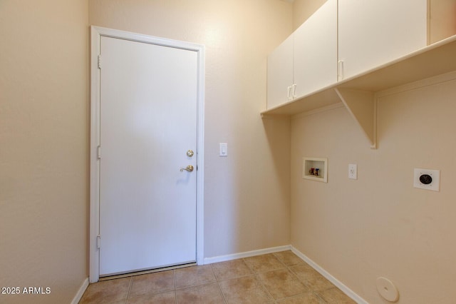 washroom with washer hookup, cabinets, and hookup for an electric dryer