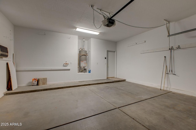 garage with a wall mounted air conditioner, a garage door opener, and water heater