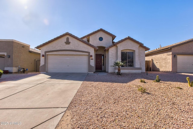 view of front of property with a garage