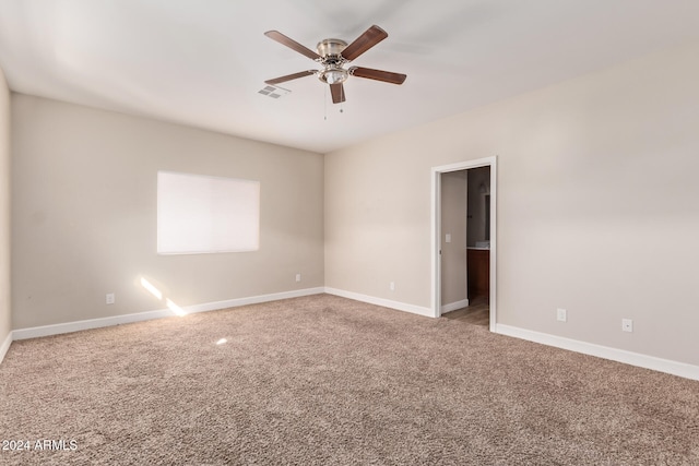 carpeted empty room with ceiling fan