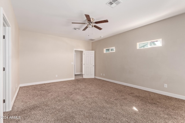 unfurnished bedroom with ceiling fan and carpet floors