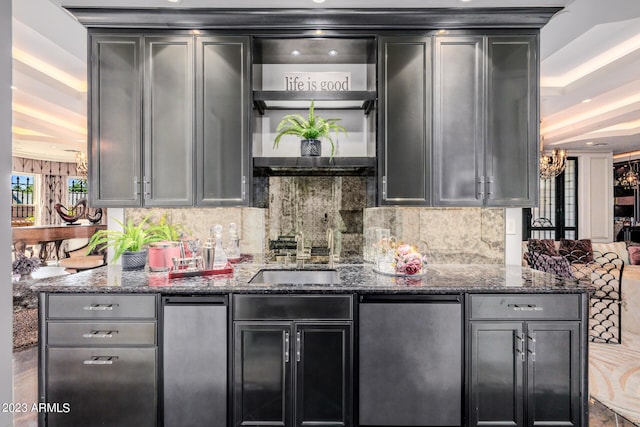 2001 N 1st Ave, Phoenix, AZ 85003 - bar with a tray ceiling, sink, dark stone counters, fridge, and tasteful backsplash