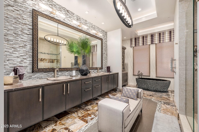 2001 N 1st Ave, Phoenix, AZ 85003 - bathroom with tile flooring, a notable chandelier, a raised ceiling, and double vanity