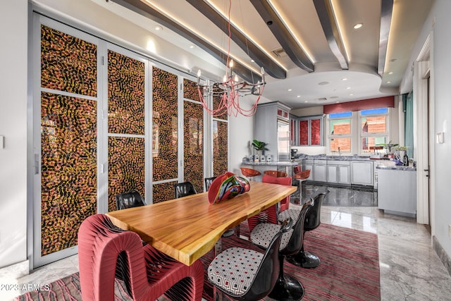 2001 N 1st Ave, Phoenix, AZ 85003 - dining room featuring a notable chandelier, sink, and light tile floors