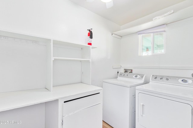 clothes washing area featuring washing machine and dryer and ceiling fan