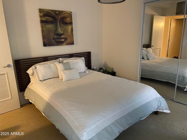 carpeted bedroom with visible vents