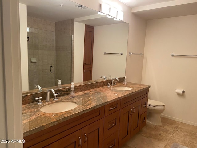 full bath featuring toilet, visible vents, a shower stall, and a sink