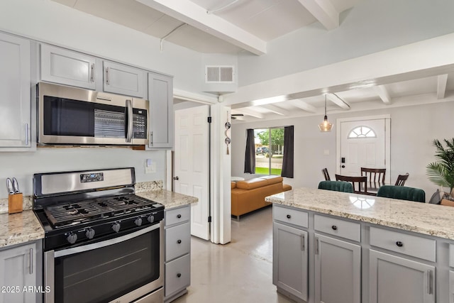 2205 W Cambridge Ave, Phoenix, AZ 85009 - kitchen with stainless steel appliances, beam ceiling, gray cabinets, and concrete flooring