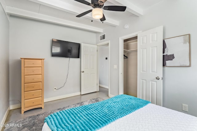2205 W Cambridge Ave, Phoenix, AZ 85009 - bedroom with beamed ceiling, concrete floors, baseboards, a ceiling fan, and a closet