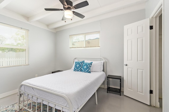 2205 W Cambridge Ave, Phoenix, AZ 85009 - bedroom with beam ceiling, baseboards, concrete flooring, and ceiling fan