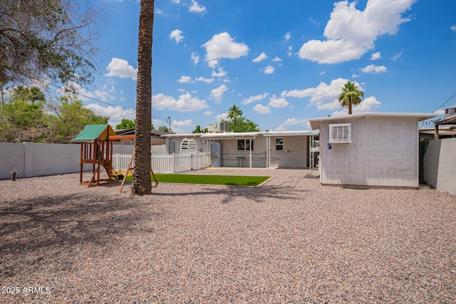 2205 W Cambridge Ave, Phoenix, AZ 85009 - back of property with a fenced backyard and a patio