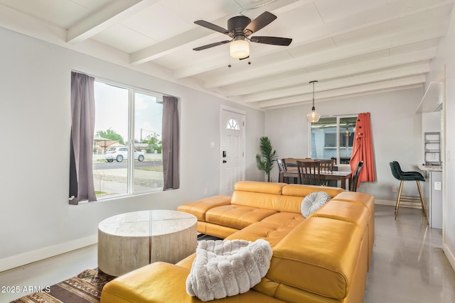 2205 W Cambridge Ave, Phoenix, AZ 85009 - living room with baseboards, concrete floors, beamed ceiling, and a ceiling fan