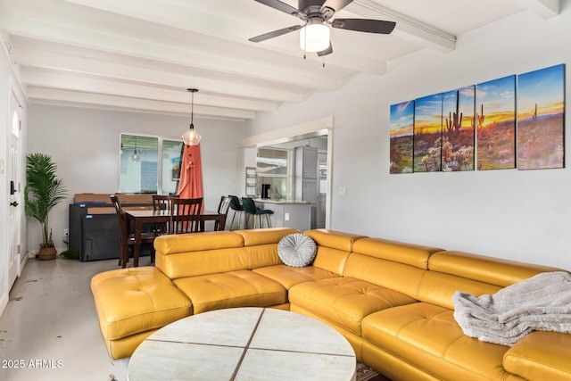 2205 W Cambridge Ave, Phoenix, AZ 85009 - living area featuring concrete floors, beam ceiling, and ceiling fan