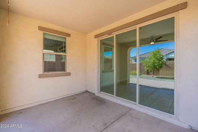 view of patio / terrace featuring ceiling fan