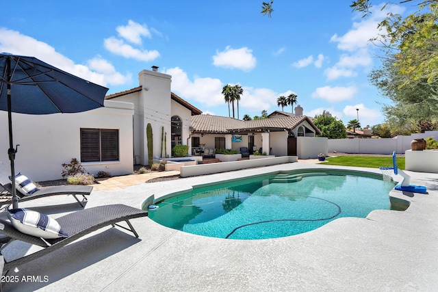 view of swimming pool with a patio, a fenced backyard, and a fenced in pool
