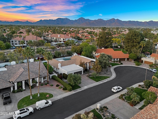 birds eye view of property featuring a mountain view and a residential view