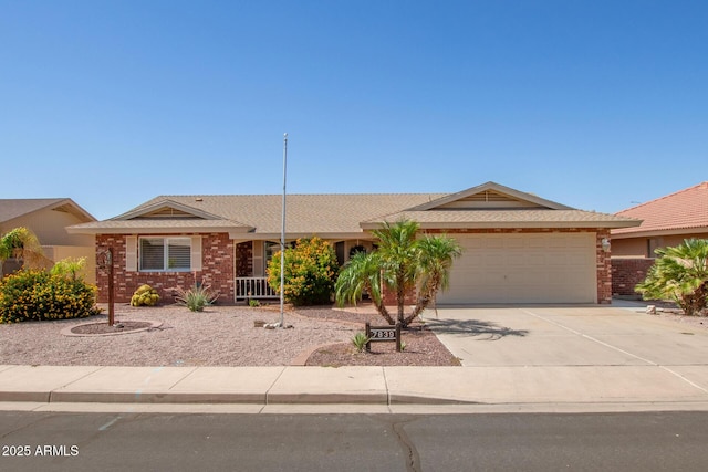 7839 E Milagro Ave, Mesa, AZ 85209 - ranch-style home with brick siding, a garage, driveway, and a shingled roof